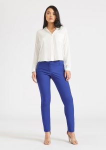 Madison modeling the Gianna Dressy Skinny Pant in Royal Blue